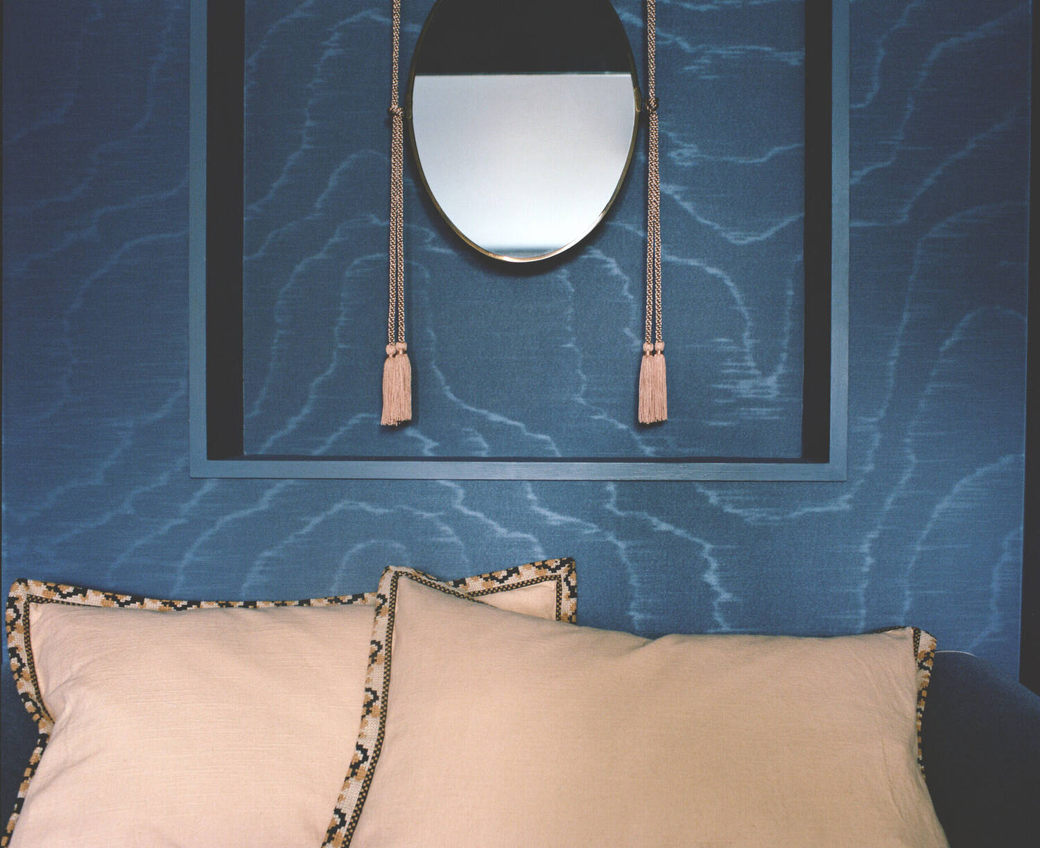 Window seat niche with embroidered cushions
